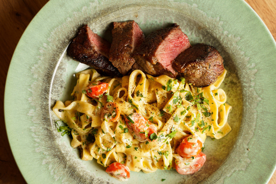 Sirloin Steak with Buttered Noodles & Roasted Vegetables
